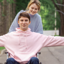 man in wheelchair celebrating outdoor access