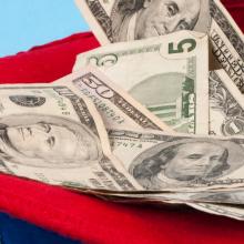 money in patriotic-colored hat