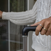 woman unlocking house door