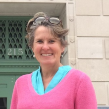 Photo of Kathleen in front of the Madison (Wisconsin) Municipal Building