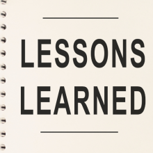 lessons learned concept written on notebook