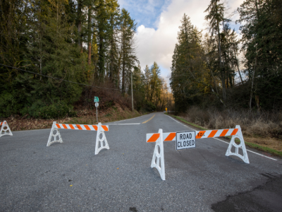 Road closure with barriers and road closed sign