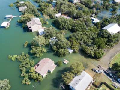 aerial view of flood waters engulfing homes