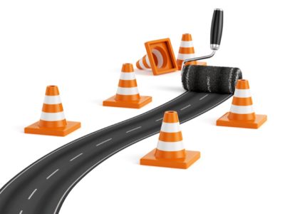 highway construction cones and pavement