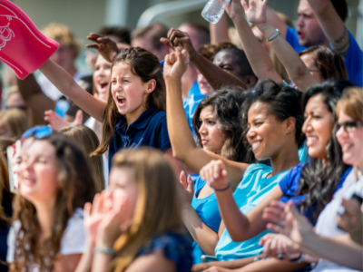 audience cheering at a school game