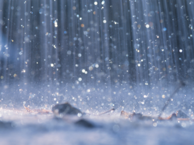 photo of rain on pavement