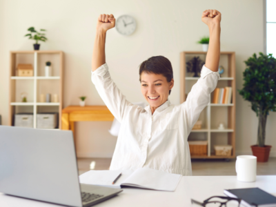 desk worker showing feeling of success