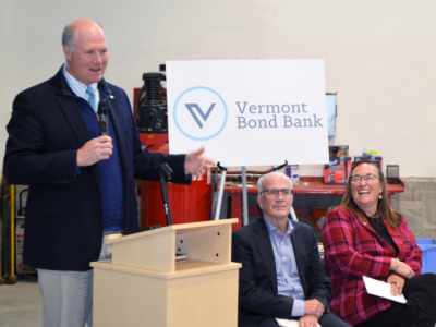 Ted Brady speaking at 10/27 press conference, with Senator Peter Welch sitting nearby