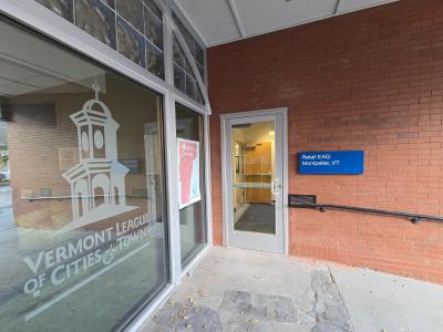 The entrance to Montpelier's new post office space is in a niche off of East State Street, next to some of VLCT's big windows.