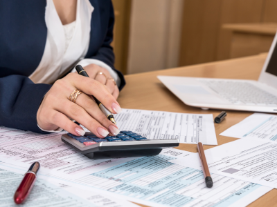 Photo of a person handling printed forms