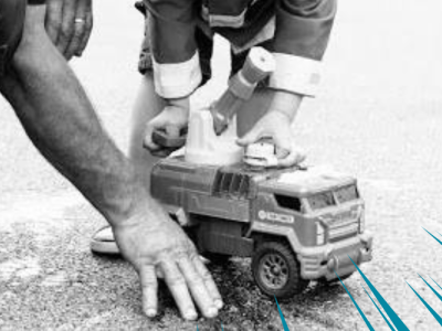 Community Lens photo of firefighter and child