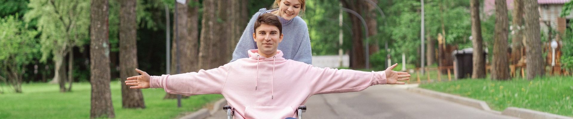 man in wheelchair celebrating outdoor access