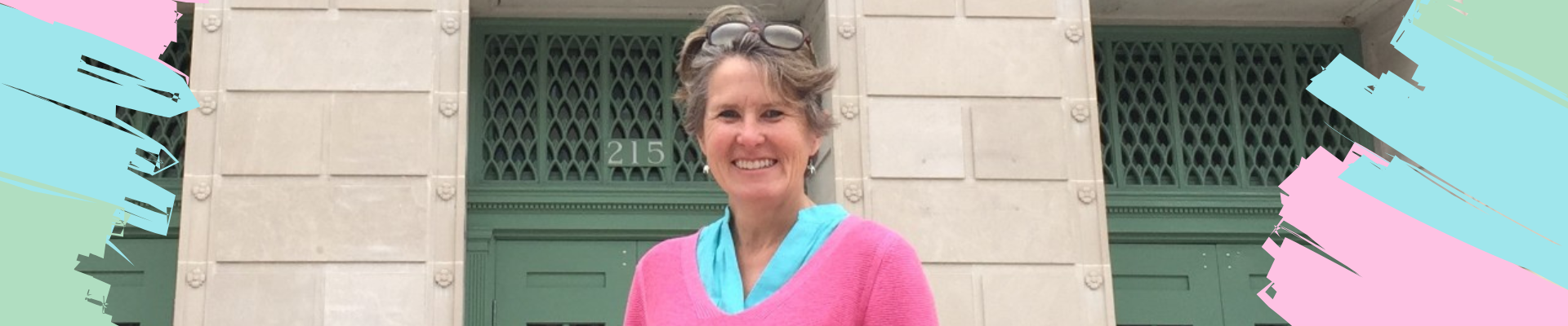 Photo of Kathleen in front of the Madison (Wisconsin) Municipal Building