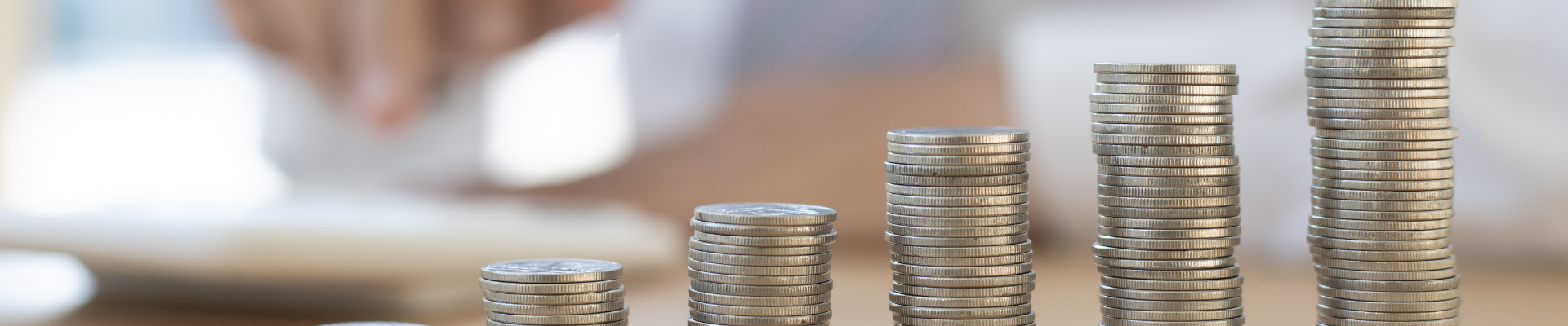 stacks of quarters that grow higher with each stack